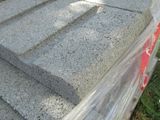 a pile of concrete blocks sitting on the ground