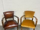 two chairs that are sitting next to each other