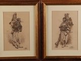 two framed drawings of a man and a woman walking together