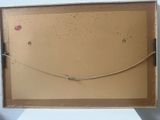 a picture of a box that has a necklace in it
