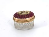 an image of a glass jar with a red lid on a white surface