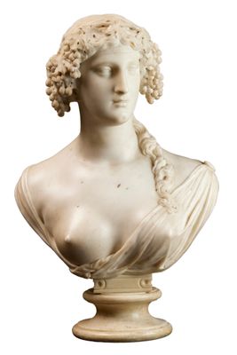 marble bust of a woman with curly hair on a pedestal