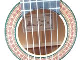 a close up of a guitar with a label on it