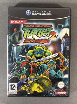 un boîtier de jeu Nintendo avec la jaquette de « Les Tortues Ninja 2 »