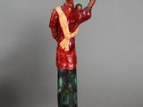 figurine of a woman carrying a pot on her head