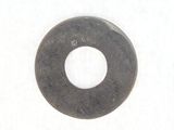 a close up of a metal washer on a white surface