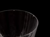 slow motion of pouring water into a glass on a black background