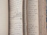 a open book that has a lot of writing on it