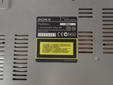 a close up of a metal device with a yellow label on it