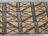 gros plan d'un morceau de tissu sur lequel est dessiné un motif