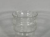 a clear glass bowl with three layers of water in it