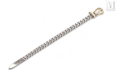 a close up of a knife on a white surface with a white background