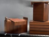three wooden boxes sitting next to each other on a table