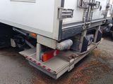 a truck that is parked on the side of the road