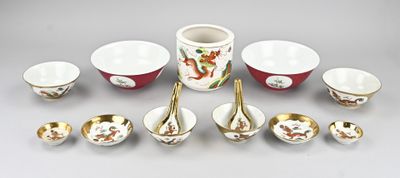 many bowls and spoons that are sitting on a table