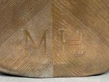 an image of a close up of a bag with a monogram on it