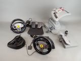 a lot of different types of racing wheels and remote controls