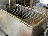 a toaster that is sitting on top of a stove