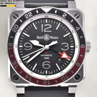 a black watch with a red second hand and a red second hand