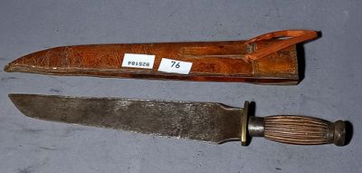 two knives that are sitting next to each other on a table