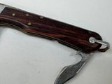 a knife that is laying on top of a table