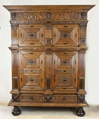 an image of a large wooden cabinet with drawers