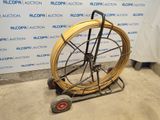 an image of a wheel with a hose attached to it