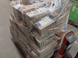 a large stack of boxes sitting on a pallet in a warehouse