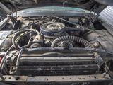 a picture of a car engine with its hood open