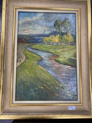 framed oil painting of a landscape with a river in a gold frame