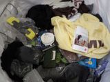 a bag full of clothes and other items in it
