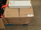 a cardboard box with a pair of shoes in it on a carton