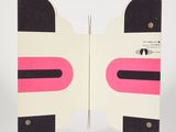 a white and pink book with a black and pink design on it