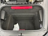 a trunk of a car with the hood open
