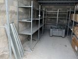 a room with shelves and boxes of items in it
