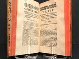 two open books that are sitting on a table