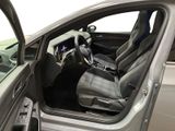the interior of a car with the door open and the driver ' s seat down