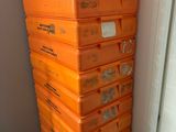 a stack of orange boxes stacked on top of each other