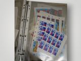 a picture of a binder with a bunch of stamps on it