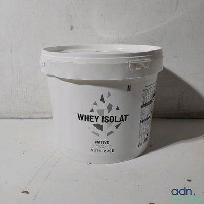 a white bucket of whey isolat sitting on a table