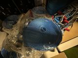 a blue hat sitting on top of a table next to a pair of scissors