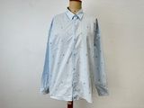 an image of a dress shirt on a mannequin stand