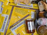 a box full of food and condiments sitting on a table