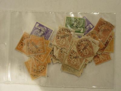 a lot of stamps in a clear bag on the table