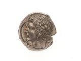une image d'une pièce de monnaie sur laquelle figure le visage d'une femme