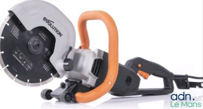 a close up of a circular saw on a white surface