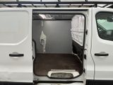 a white van with the door open in a garage