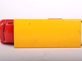 two red and yellow boxes sitting next to each other on a white surface