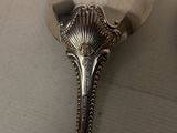 a spoon that is sitting on top of a table