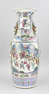 a large vase with a painting on it sitting on a table